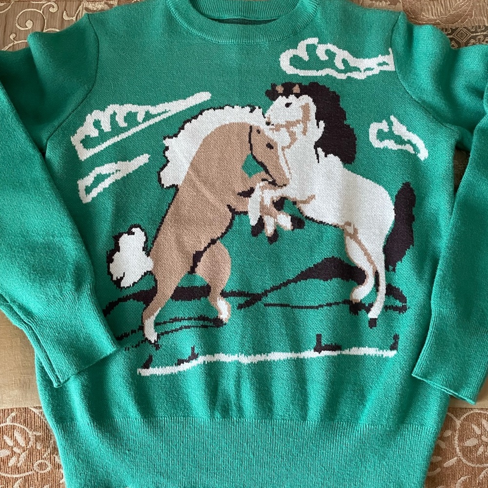 Vintage wool sweater with horses. Size med.